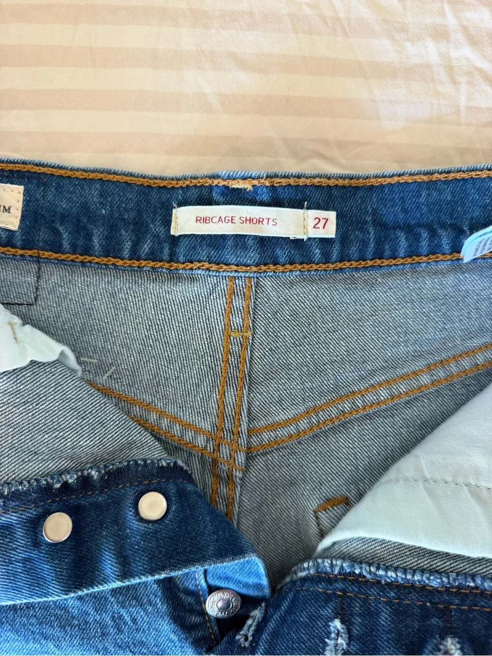 Levi's Blue Denim Asymmetric Raw Hem Jean Shorts